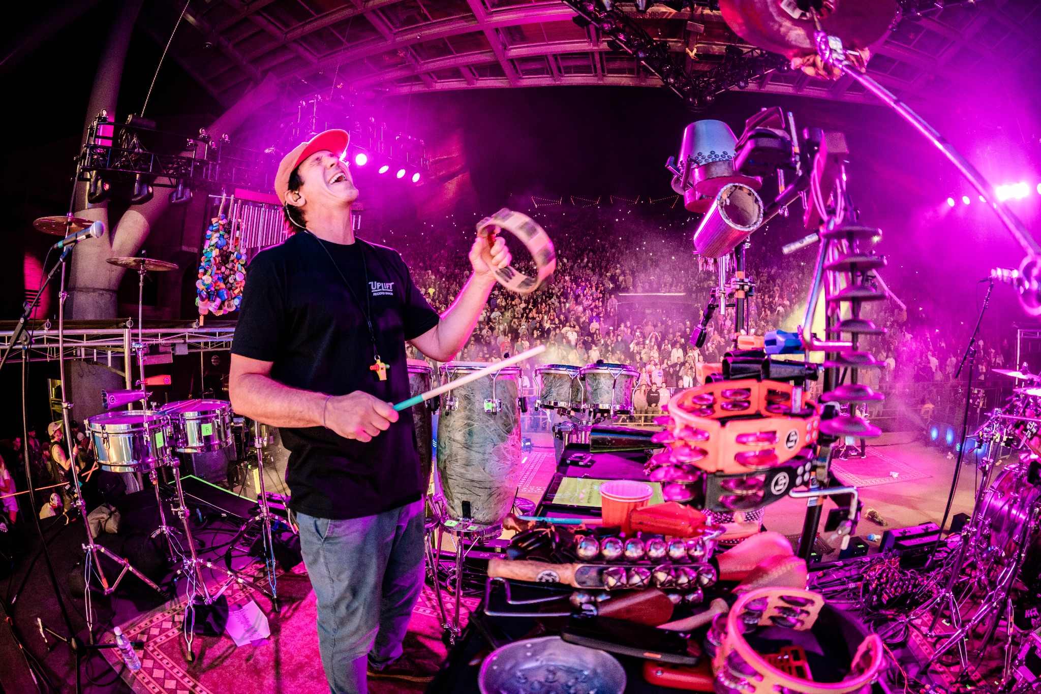 Will Phillips performing at his touring percussion rig in front of a large crowd